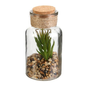 Plante artificielle dans une fiole en verre